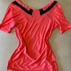 Salmon colored lace back short sleeve BKE shirt.